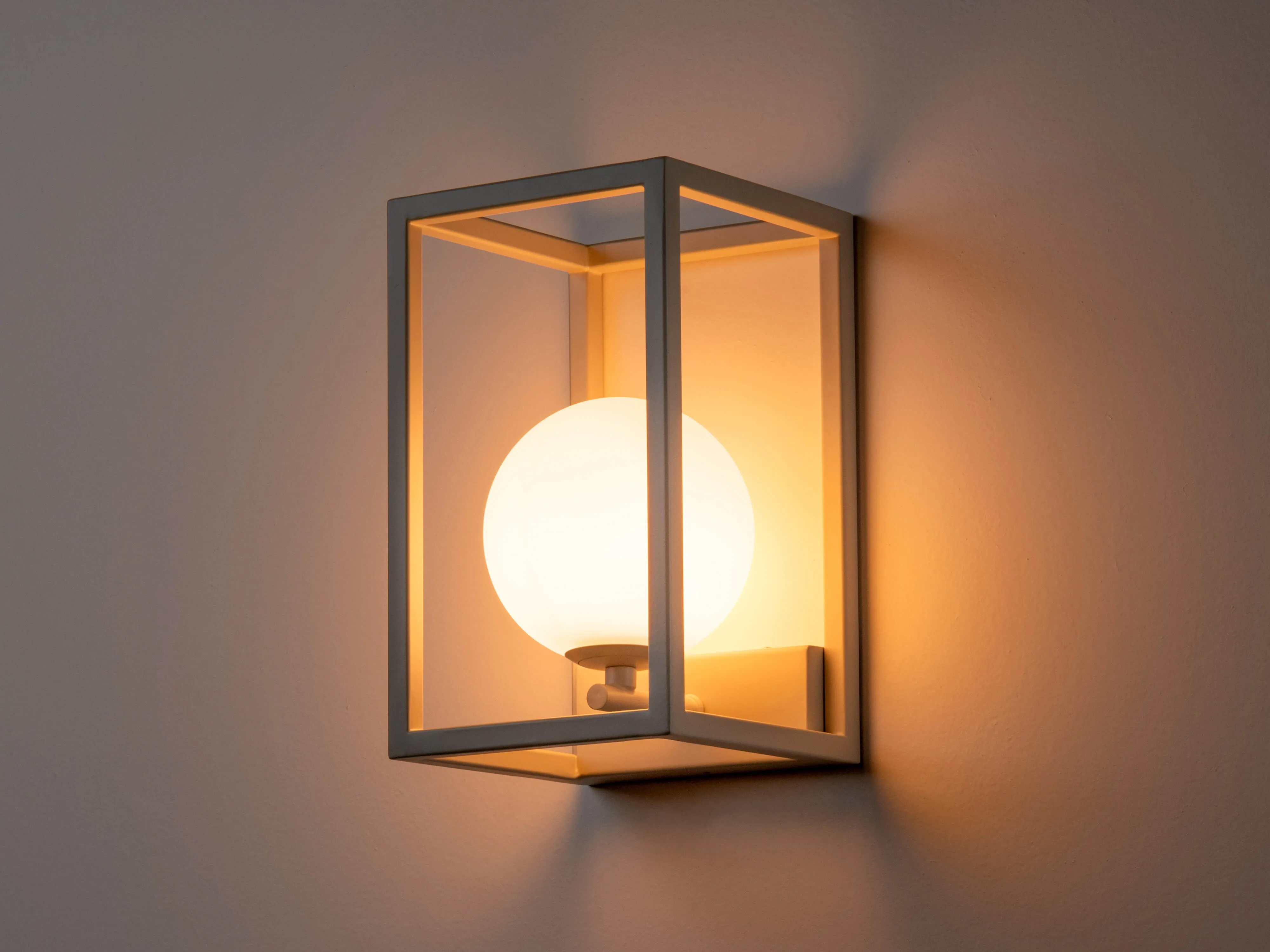 Sand lantern wall light